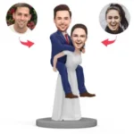 Bride carrying groom custom wedding caketopper