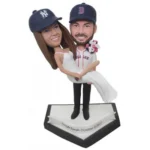 Sports groom lifting bride custom wedding caketopper