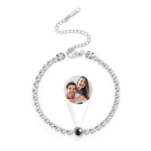 Personalized photo projection bracelet with crystal chain, featuring a custom couple image displayed from the projection charm