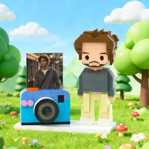 Custom brick figure of a man with a beard, displayed beside a camera-themed photo holder with a personalized image, set in a colorful outdoor landscape background