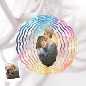 Personalized hanging wind spinner with colorful spiral design, featuring a custom couple photo at the center, displayed against a soft white background
